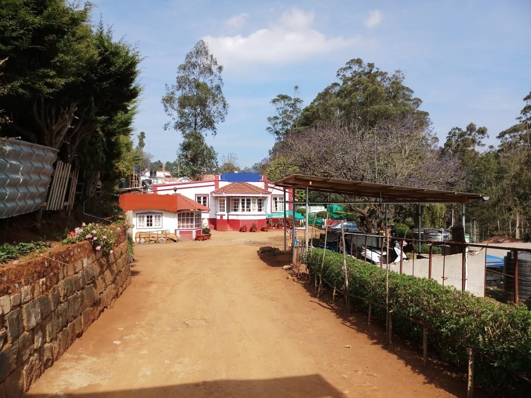 1.82 acres Bungalow with shops for sale in ooty opp to OOTY boat house